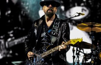Dave Stewart performing live with guitar
